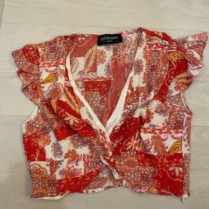 KITTENISH cropped blouse. In size medium. Has never been worn.